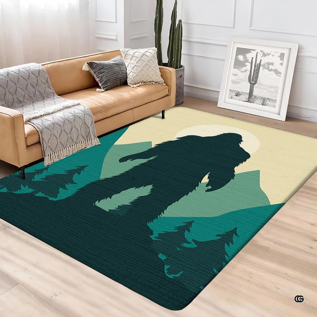 Modern lounge interior with leather couch and cactus featuring sasquatch mountain moon silhouette rug