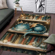 Cute baby blue dragon sleeping on a snow-dusted library bookshelf with warm festive fairy lights area rug. - thumbnail image 7 of 8
