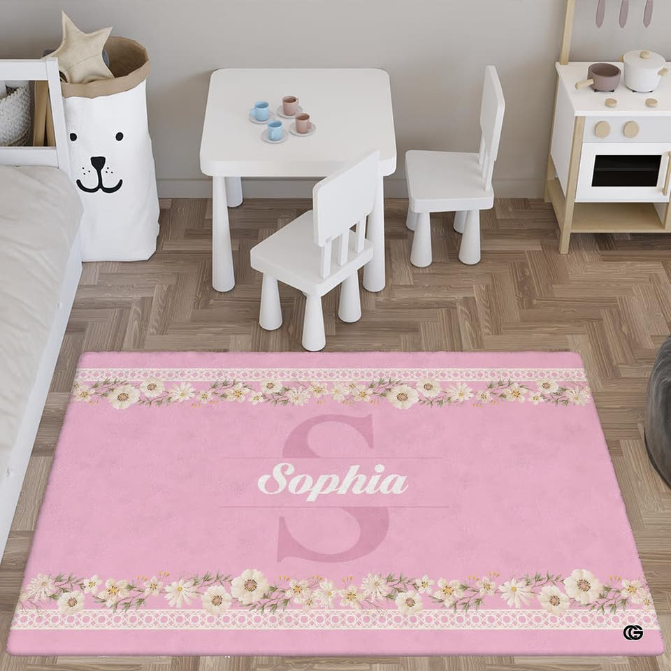 Pink floral border rug in a bright playroom