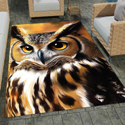 decorative accent horned owl area rug displayed on floor with detailed feather artwork and amber eyes. - thumbnail image 1 of 8