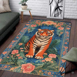 Royal blue floral tapestry seated tiger living room area rug in front of a modern couch