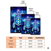 Overhead view of glowing aqua sea turtle motif on navy background. - thumbnail image 2 of 7