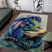 Blue and purple fantasy dragon reading an ancient tome while breathing magical wisps of smoke area rug. - thumbnail image 7 of 8