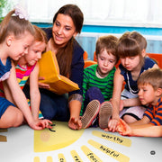 Radiant sun beam floor accent styled beside playroom toy storage in light modern setting. - thumbnail image 5 of 7