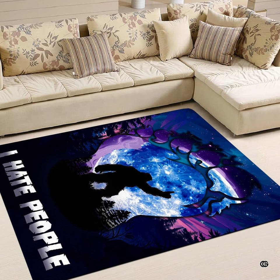 Bigfoot lantern area rug showing full moon and forest graphic in a styled room