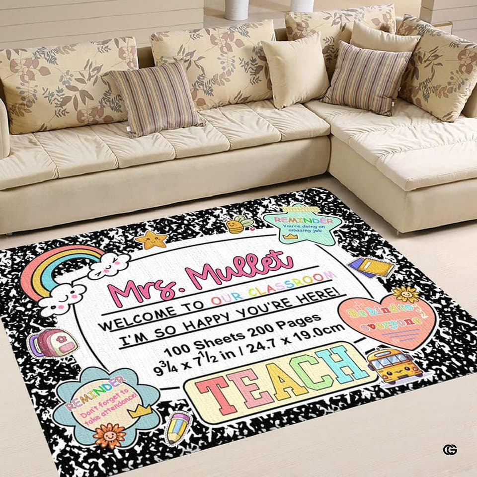 Composition notebook styled classroom area rug displayed on light floor in front of a living room sofa.