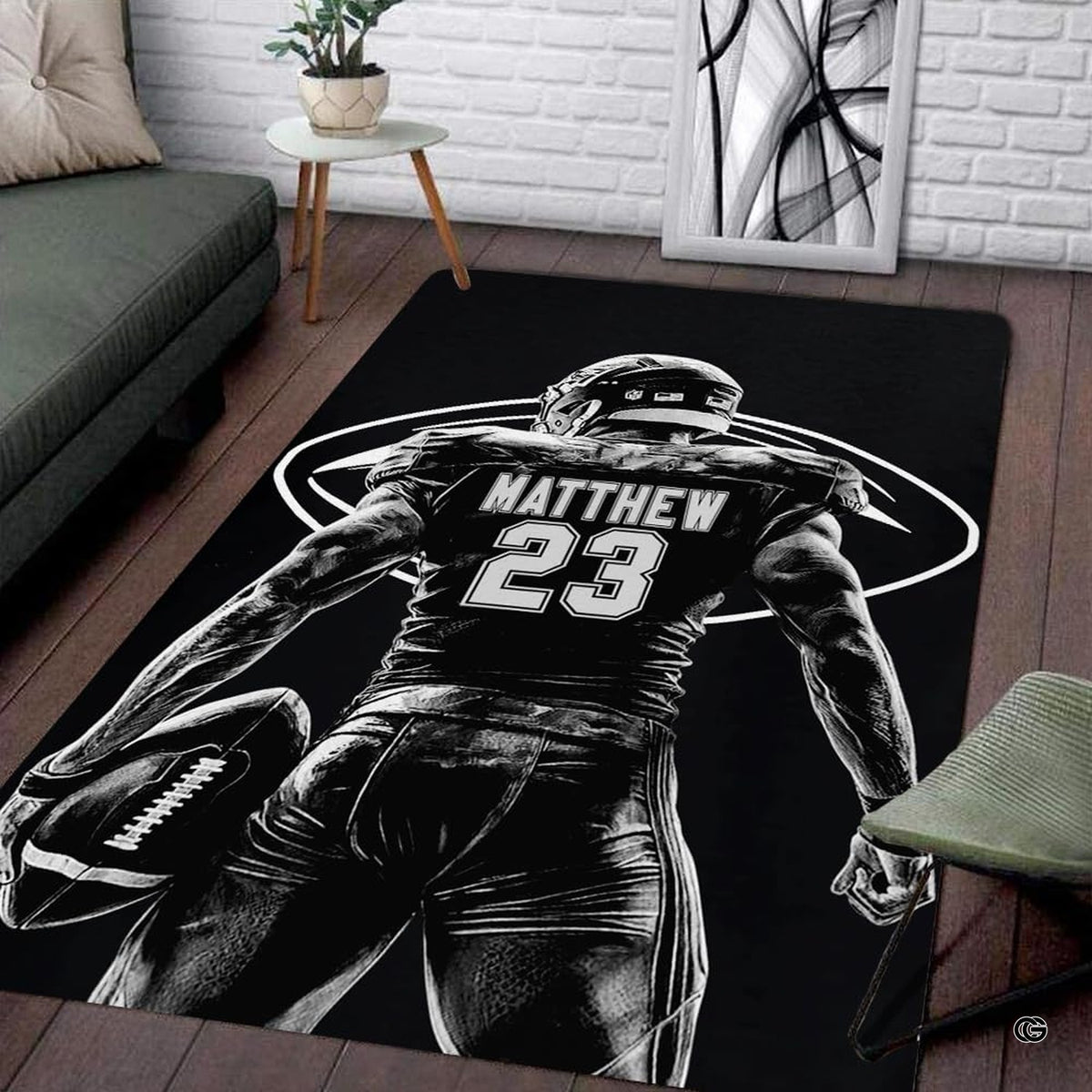 Living room floor setting featuring a monochrome football player sketch athletic area rug