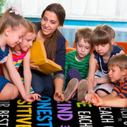 Lifestyle scene featuring teacher and students gathered around teamwork rug. - thumbnail image 5 of 7