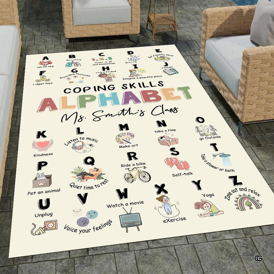 Educational classroom area rug with thematic accent grid sections and soothing pastel borders.