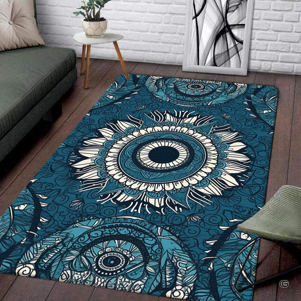 Teal sunburst mandala medallion rectangular area rug displayed on wood flooring in a modern living room setting.