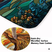 Fireside lounge setting with a person relaxing on the stained glass sunset tree rug - thumbnail image 5 of 8