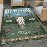 Rustic hunting lodge area rug displaying decorative accent skull, crossed rifles, and forest trees in a cabin room.