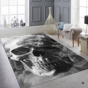 Floor layout view showing the complete monochrome sculpted skull emerging from wisps of vapor - thumbnail image 2 of 8