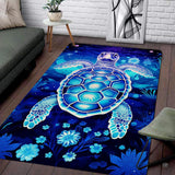Glowing sea turtle habitat area rug showcasing turquoise coral and navy flora.