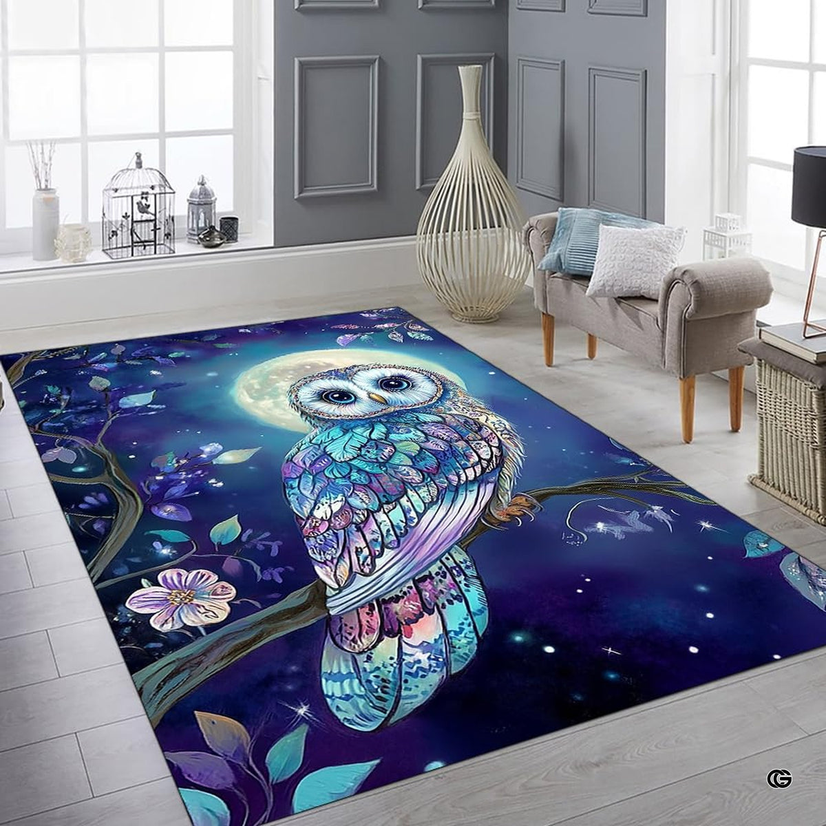 High-angle view highlighting the rich teal, navy, and purple tones across the artistic area rug. - image 8 of 8