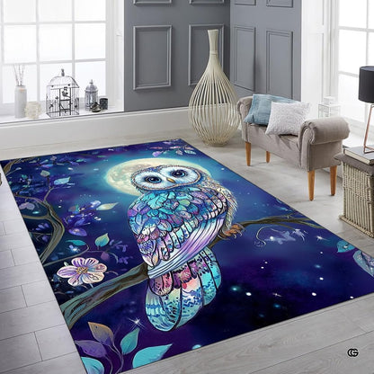 High-angle view highlighting the rich teal, navy, and purple tones across the artistic area rug. - thumbnail image 8 of 8