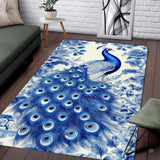 Living room setting featuring a blue and white porcelain peacock wildlife area rug